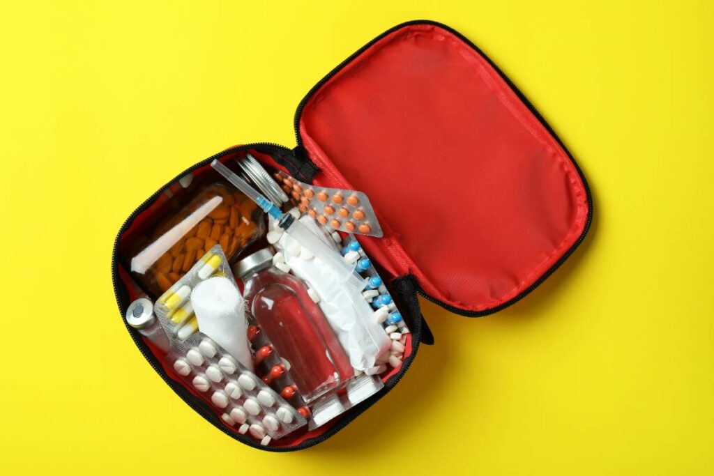 first-aid-medical-kit-on-yellow-background-2023-11-27-05-07-10-utc