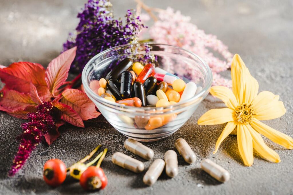 pharmacological-pills-in-glass-bowl-and-colored-fl-2023-11-27-05-17-50-utc